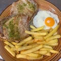 P.C.-1.LOMO A LA PLANCHA, PATATAS Y HUEVO FRITO